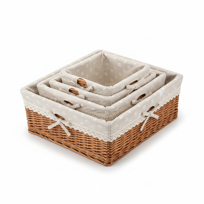 Set of three empty lined wicker baskets on a white background