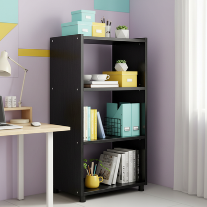 Tall black open shelf holding books, files, storage boxes, a plant and office accessories
